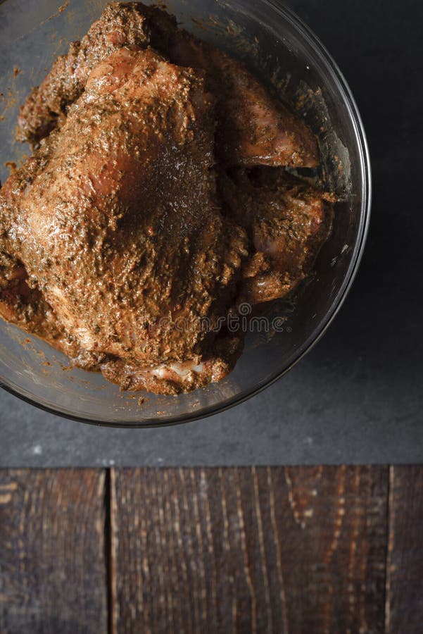 Butter Chicken in a Glass Bowl on a Table Closeup Stock Photo Image