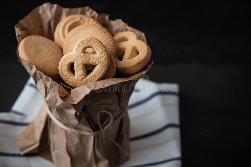 Butter Cookies in a Paper Bag on the Table Closeup Stock Photo Image