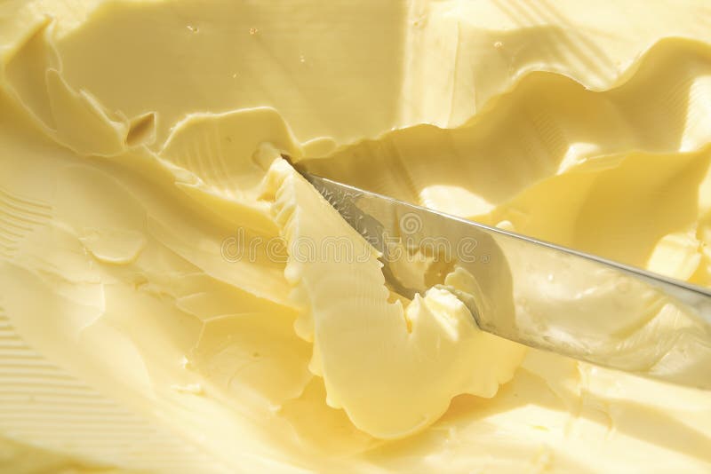 Butter and knife stock image. Image of melting, milk 43430541