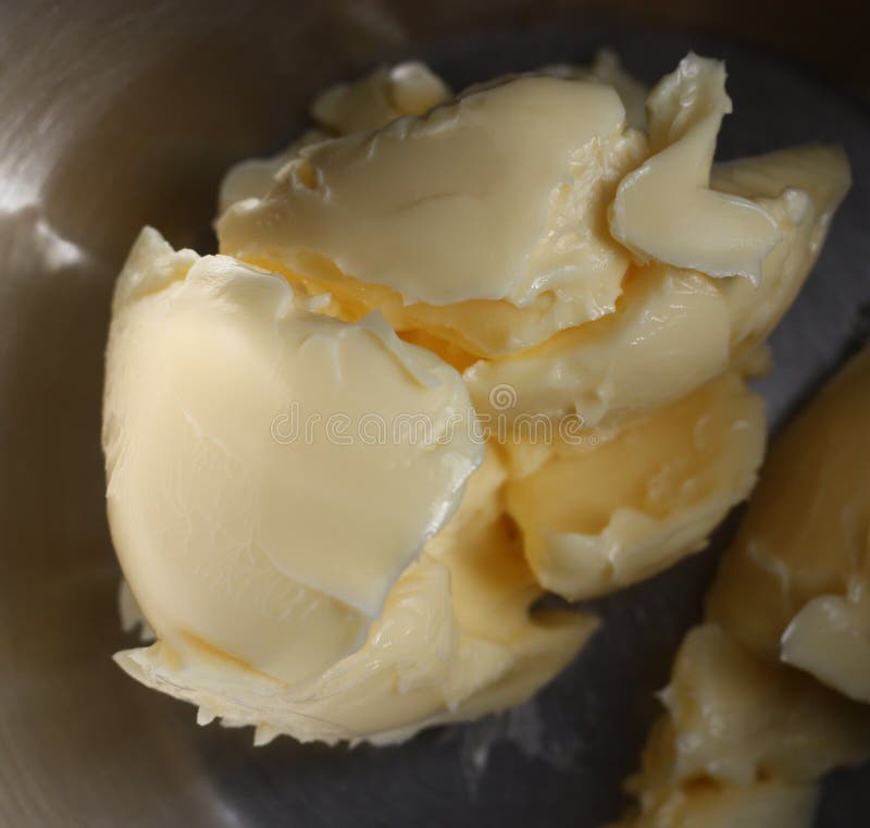 Butter in mixing bowl stock photo. Image of bowl, closeup 48502912