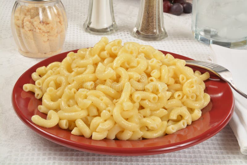 Buttered macaroni noodles stock image. Image of parmesan 51097587