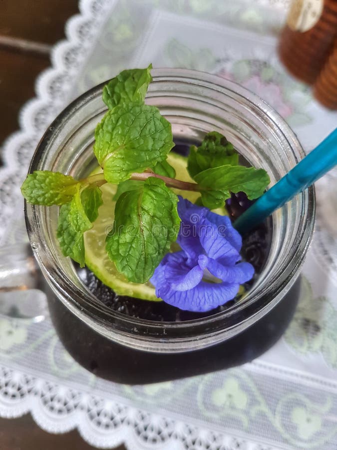 Butterfly Pea Lemonade with Fresh Mint and Flower Stock Photo Image