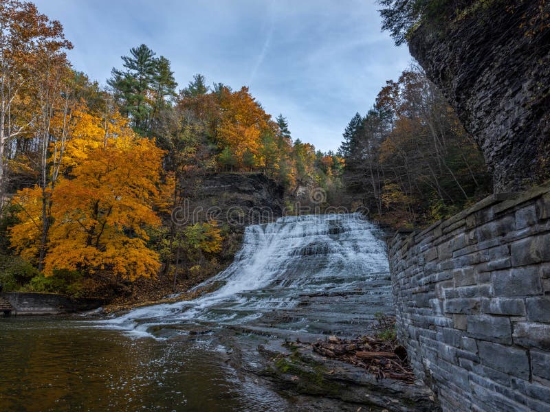 Buttermilk Falls Surrounded By Brilliant Fall Foliage In Long Lake NY