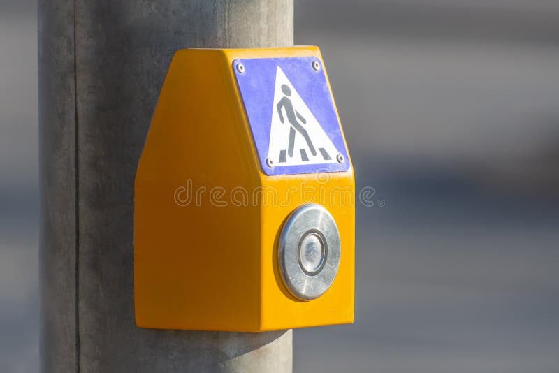 A button to turn on the green light at a pedestrian crossing on the highway royalty free stock photo A button to turn on the green light at a pedestrian crossing on the highway royalty free stock photo