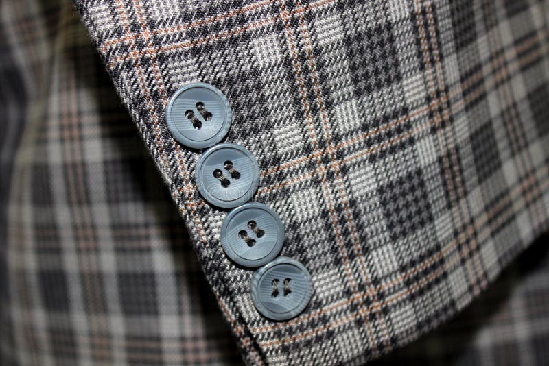 Closeup of buttons on a business suit coat. Closeup of buttons on a business suit coat