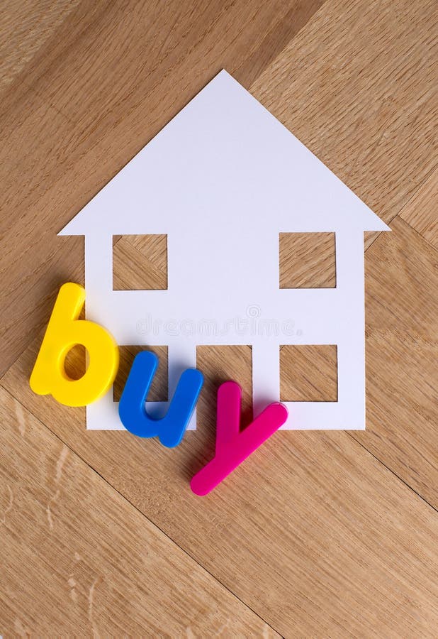 Buy House Home symbol on wooden background stock photo Buy House Home symbol on wooden background stock photo