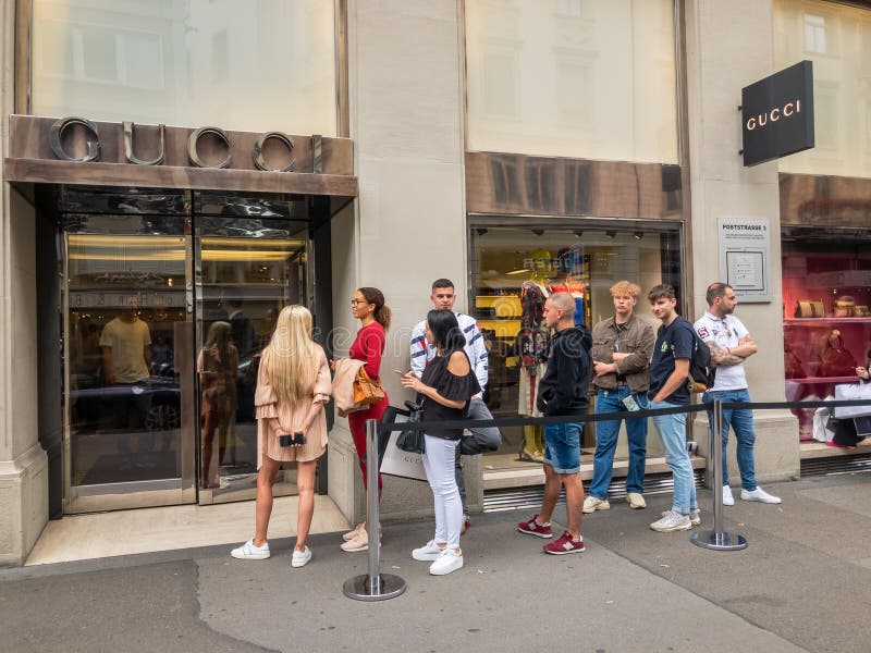 Buyers Waiting in Line To Visit Gucci Outlet during Sale Time Editorial  Stock Photo - Image of people, boutique: 180445973