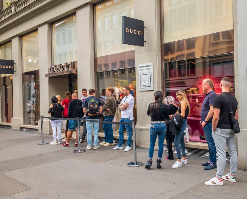 Buyers Waiting in Line To Visit Gucci Outlet during Sale Time Editorial  Photo - Image of consumerism, shopping: 180445976