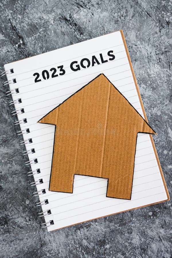 Buying a House or Settling Down, 2023 Goals on Notebook with Cardboard