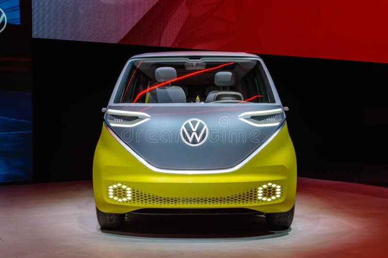 FRANKFURT - SEP 15, 2019: Yellow silver VW ID Buzz or ID.Buzz. Electric Volkswagen Bulli minivan is zero-emission concept car, microbus developed for series production at IAA 2019 Frankfurt Motor Show. FRANKFURT - SEP 15, 2019: Yellow silver VW ID Buzz or ID.Buzz. Electric Volkswagen Bulli minivan is zero-emission concept car, microbus developed for series production at IAA 2019 Frankfurt Motor Show