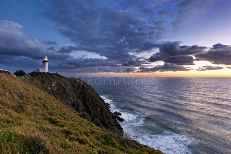 Byron Bay lighthouse, Australia, at sunrise. Pacific Ocean from most easterly point of Australia. Byron Bay lighthouse, Australia, at sunrise. Pacific Ocean from most easterly point of Australia.