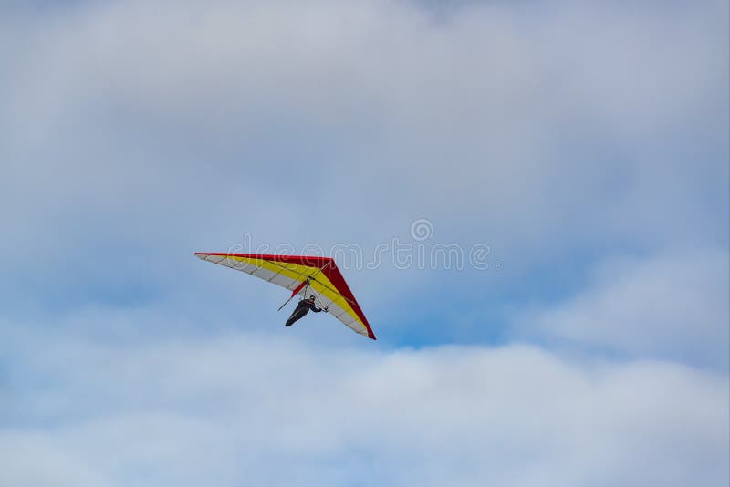 2020-02-09 Byshiv, Ukraine. Lonely red hang glider soar in the sky royalty free stock photos 2020-02-09 Byshiv, Ukraine. Lonely red hang glider soar in the sky royalty free stock photos