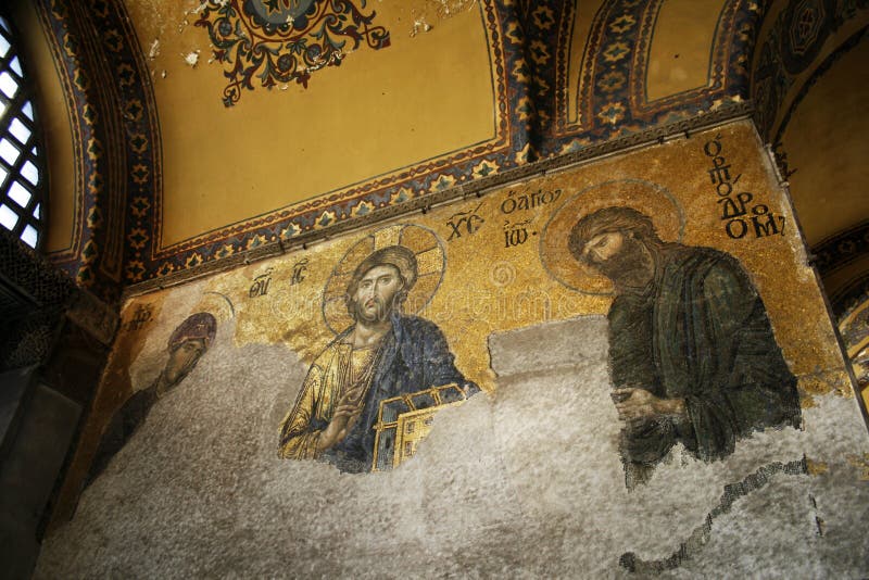 Jesus Christ, the virgin and child and the virgin as Byzantine mosaics on the wall of the Hagia Sofia in Istanbul. Jesus Christ, the virgin and child and the virgin as Byzantine mosaics on the wall of the Hagia Sofia in Istanbul