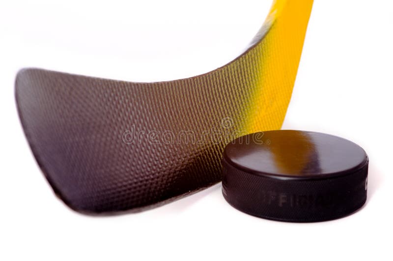 Bâton et galet d'hockey image libre de droits Bâton et galet d'hockey image libre de droits