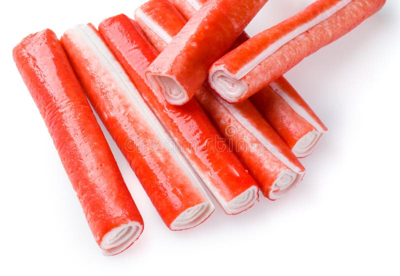 Bâtons de crabe d'isolement sur le fond blanc images stock