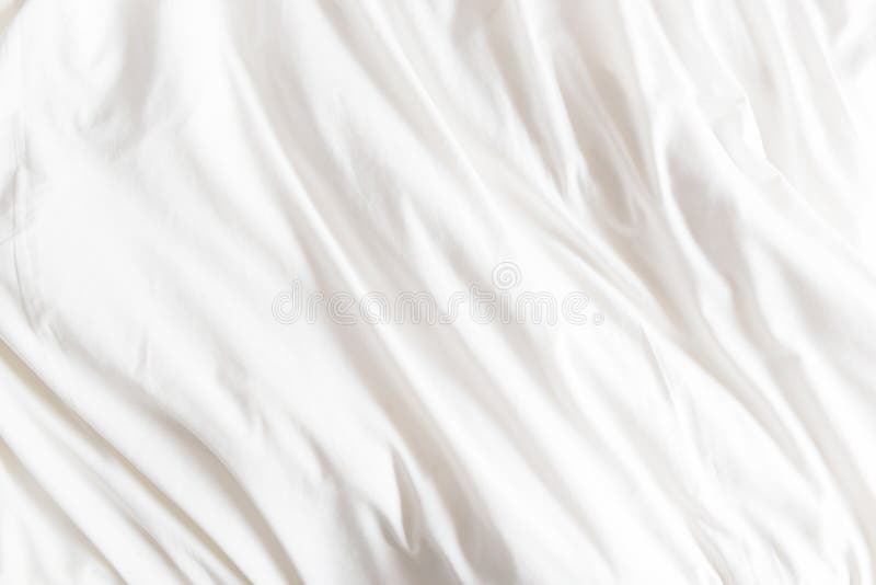 Bästa sikt av skrynklor på ett ogjort sängark royaltyfri foto Bästa sikt av skrynklor på ett ogjort sängark royaltyfri foto