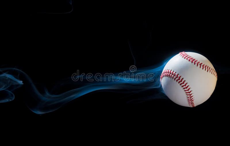 Baseball illusion flying through the black sky. Baseball illusion flying through the black sky.