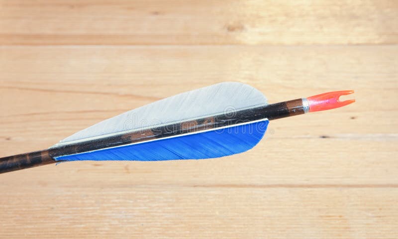 Closeup of an aluminium aarow fletching and nock that has seen obvious use. Closeup of an aluminium aarow fletching and nock that has seen obvious use