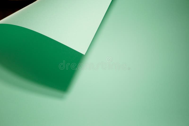 Böjt vinkelpapper. myntfärg. fotografering för bildbyråer