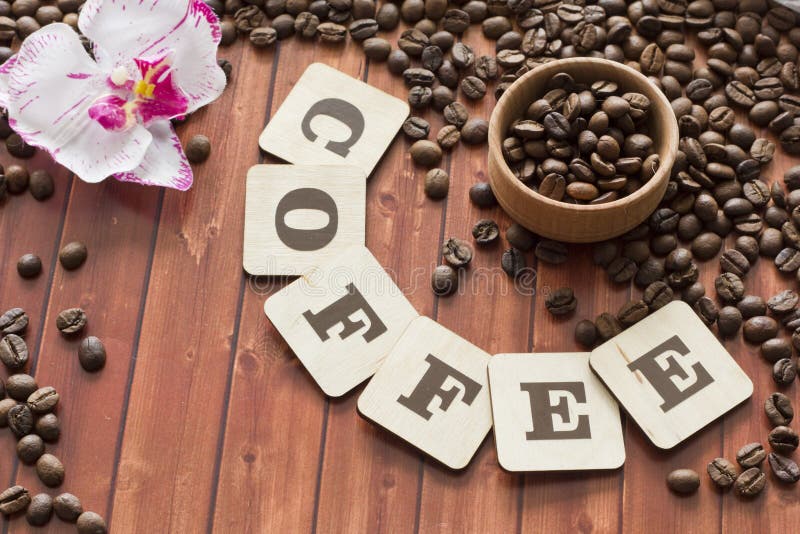 Coffee beans scattered on the table. Coffee beans scattered on the table