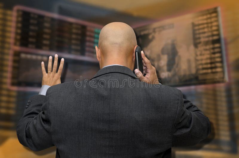 Businessman or stock broker at the phone in stock exchange. Businessman or stock broker at the phone in stock exchange