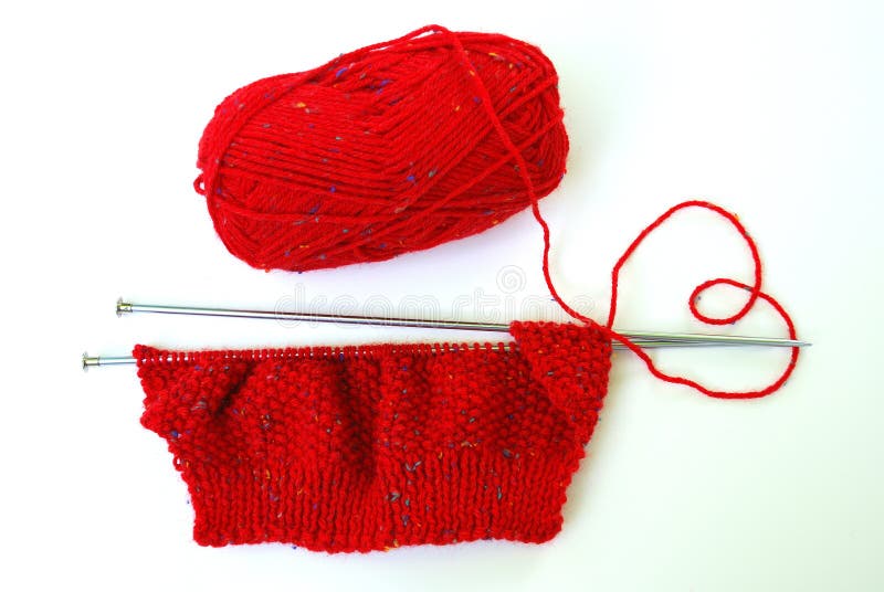 Knit red sweater with love. Knitting is a method by which thread or yarn may be turned into cloth. Knitting consists of loops called stitches pulled through each other. The active stitches are held on a needle until another loop can be passed through them. Knitting may be done by hand or by machine. By hand, there are numerous styles and methods. Flat knitting, which is done on two straight needles, produces a length of cloth, while circular knitting, which is done on circular or double-pointed needles, produces a seamless tube. Different yarns and knitting needles may be used to achieve different end products, by giving the final piece different color, texture, weight, or integrity. Knit red sweater with love. Knitting is a method by which thread or yarn may be turned into cloth. Knitting consists of loops called stitches pulled through each other. The active stitches are held on a needle until another loop can be passed through them. Knitting may be done by hand or by machine. By hand, there are numerous styles and methods. Flat knitting, which is done on two straight needles, produces a length of cloth, while circular knitting, which is done on circular or double-pointed needles, produces a seamless tube. Different yarns and knitting needles may be used to achieve different end products, by giving the final piece different color, texture, weight, or integrity.