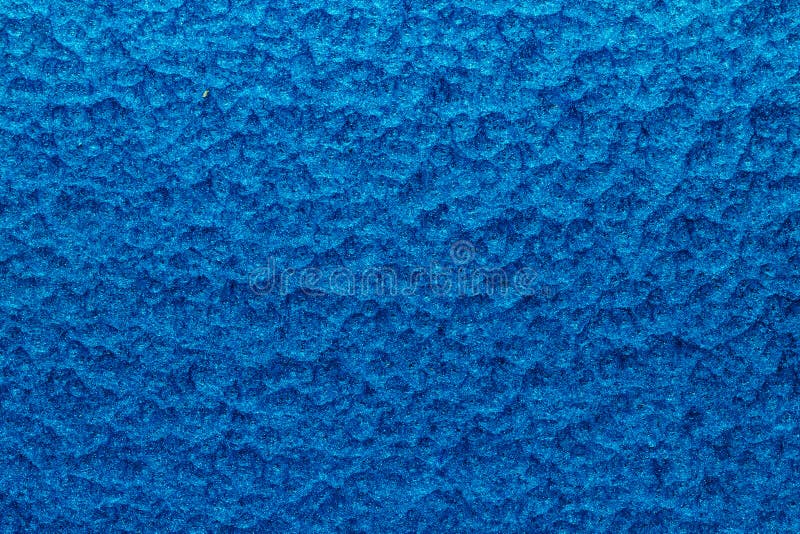 Blue hammered metal background,abstract metalic texture, sheet of metal surface painted with hammer paint. Blue hammered metal background,abstract metalic texture, sheet of metal surface painted with hammer paint.