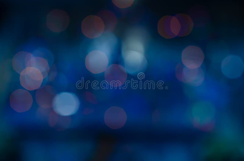 Błękitny bokeh abstrakta tło różowe plama zmroku purpury fotografia stock