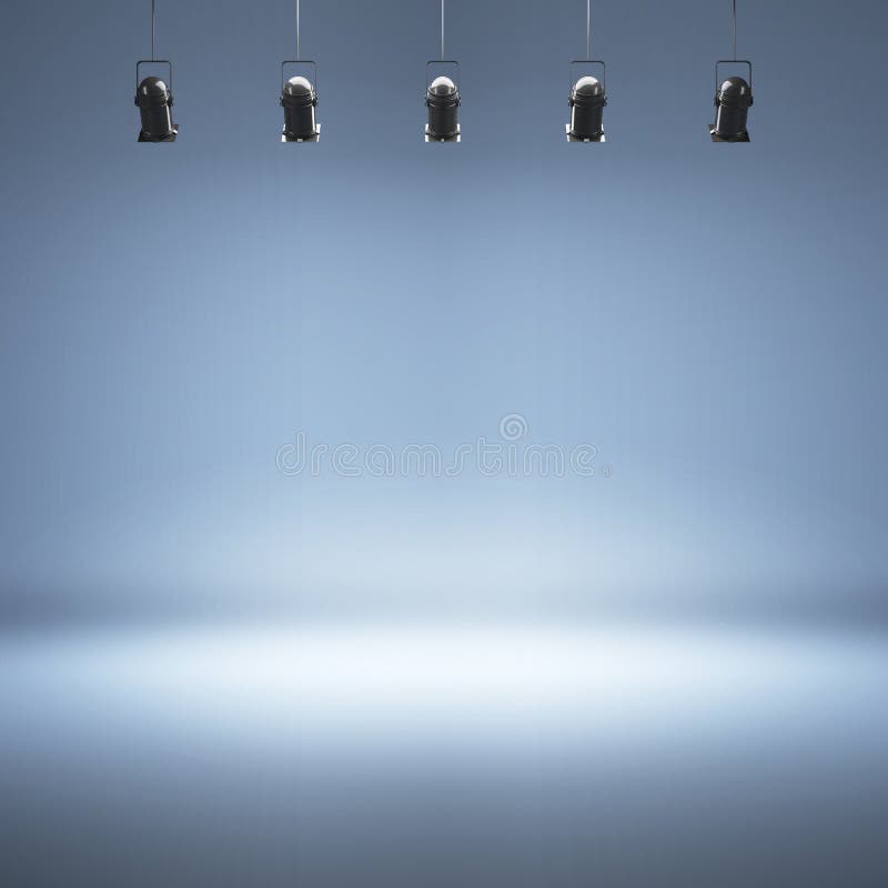 Błękitny pracowniany tło z światłami reflektorów