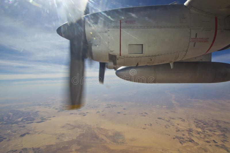 A c-130 engine view overlooking the Jordan desert