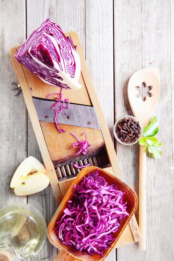 https://thumbs.dreamstime.com/b/cabbage-apple-salad-ingredients-table-close-up-fresh-purple-wooden-shredder-wooden-ladle-49216692.jpg