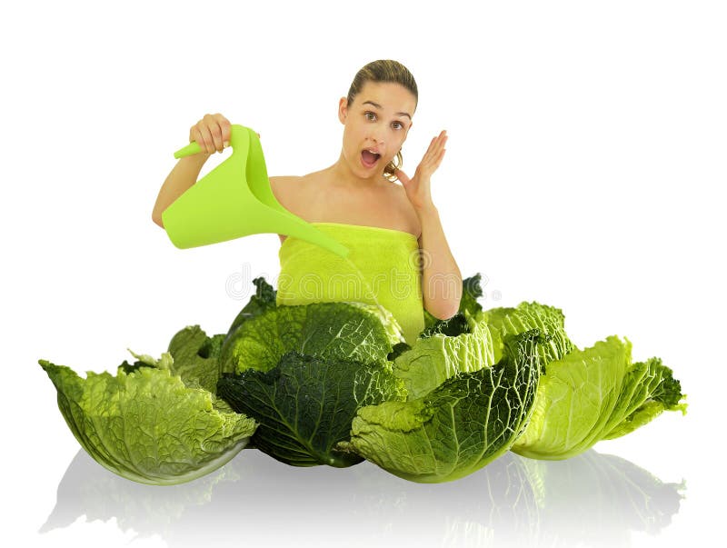 Baby among cabbage leaves stock photo. Image of white 8703510