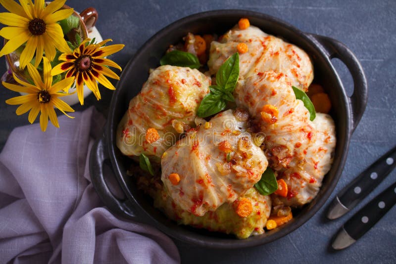 Cabbage rolls with meat, rice and vegetables. Stuffed cabbage leaves with meat. Chou farci, dolma, sarma, golubtsi or golabki. stock image Cabbage rolls with meat, rice and vegetables. Stuffed cabbage leaves with meat. Chou farci, dolma, sarma, golubtsi or golabki. stock image