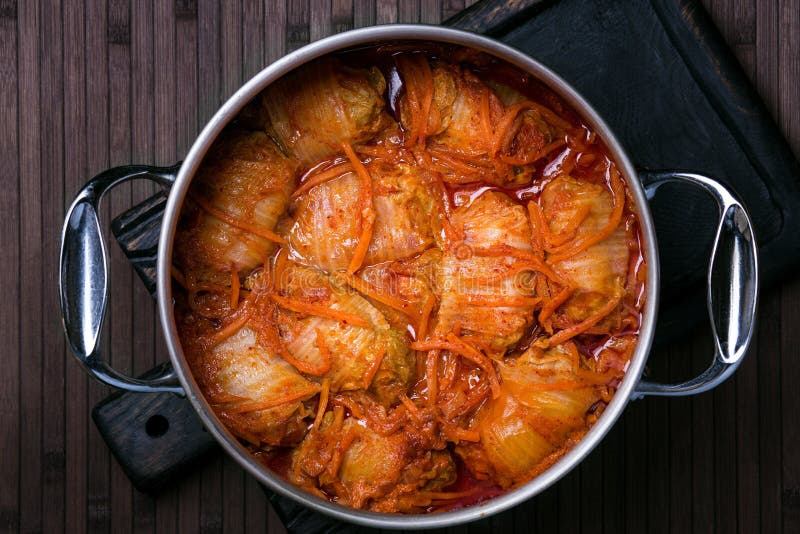 Cabbage rolls in tomato gravy on a white plate. stock photography Cabbage rolls in tomato gravy on a white plate. stock photography