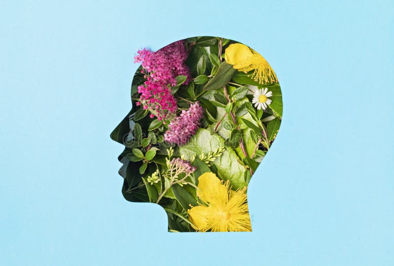 Cabeça cortada com folhas verdes e flores. saúde mental bem-estar emocional emoções contentes autocuidados psicologia verde