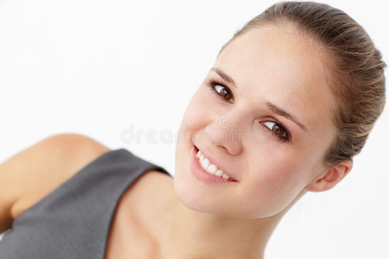 Cabeça e ombros de mulher nova imagem de stock royalty free Cabeça e ombros de mulher nova imagem de stock royalty free