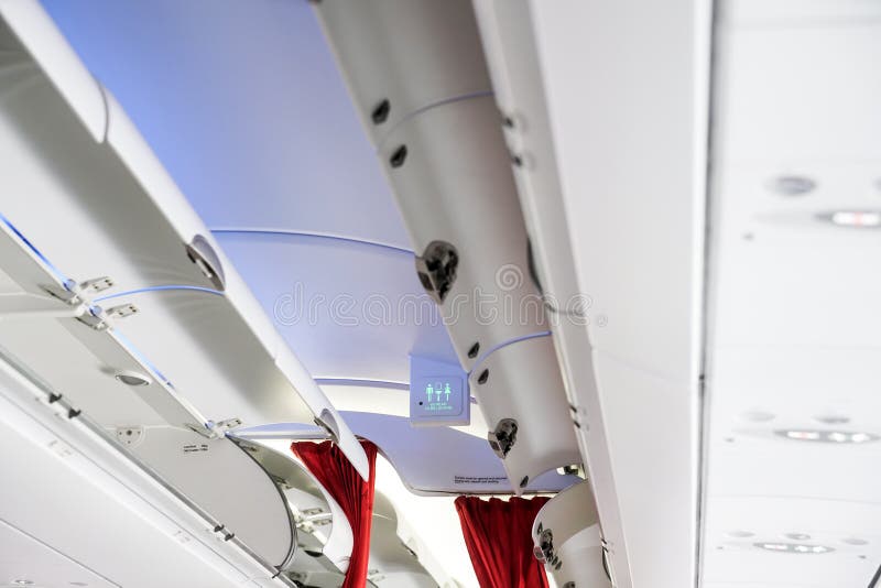 The Cabin Luggage on Airplane Stock Image Image of tourist, interior