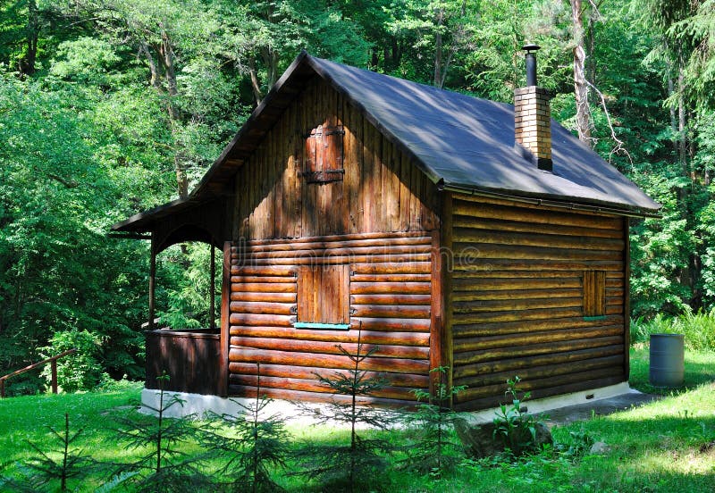 Cabin in the woods stock images