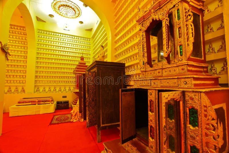 Cabinet and furniture inside Buddhist hall