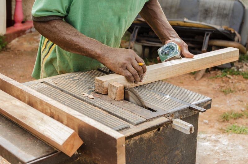 Measure Carpenter As A Furniture Maker By The Wood Stock Photo