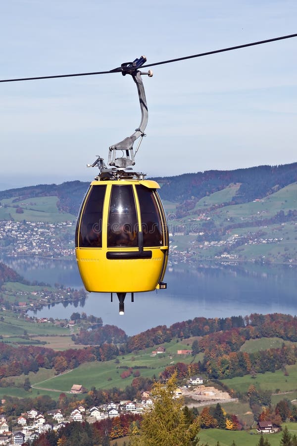 Cable car over alpine lake