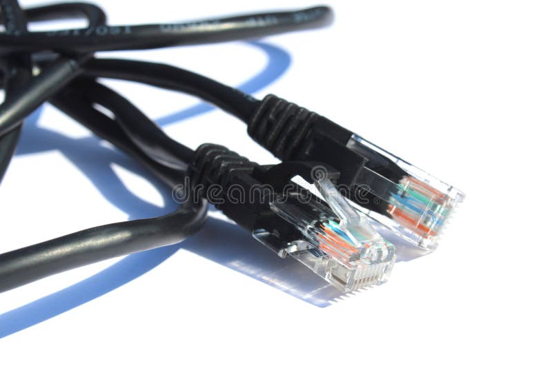 The black cable for connection lies on a white isolated background. stock photos