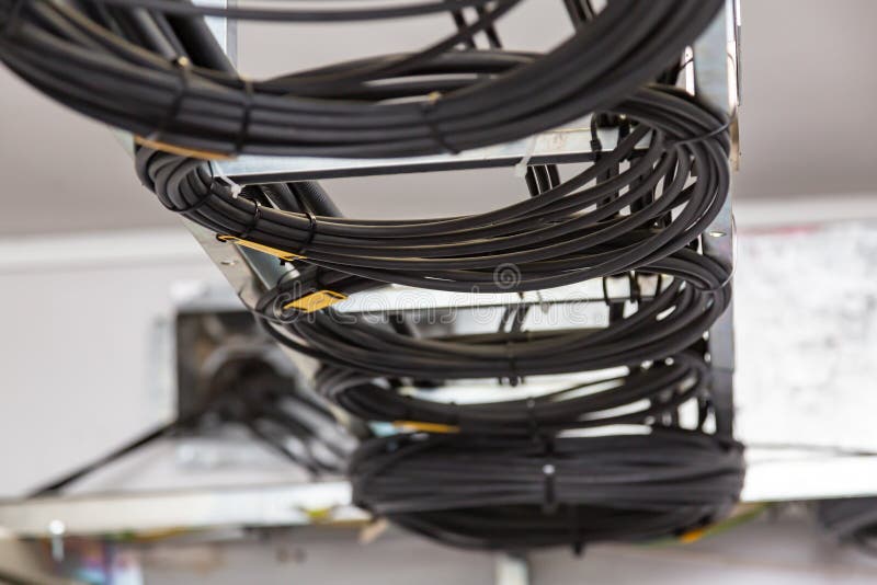 Cable Management. Working Wires, Black Cables Wound into a Coil, a Circle Stock Photo Image of