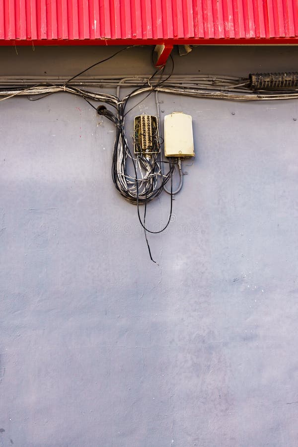 Cable Power Cords in Tangled Mess on Wall Outdoor Stock Image Image