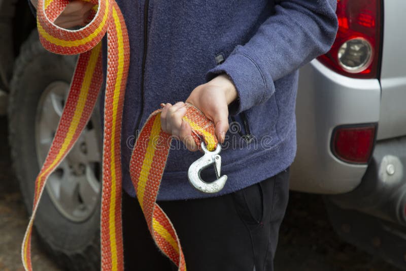 A cable for pulling a stuck car and towing a car royalty free stock photos