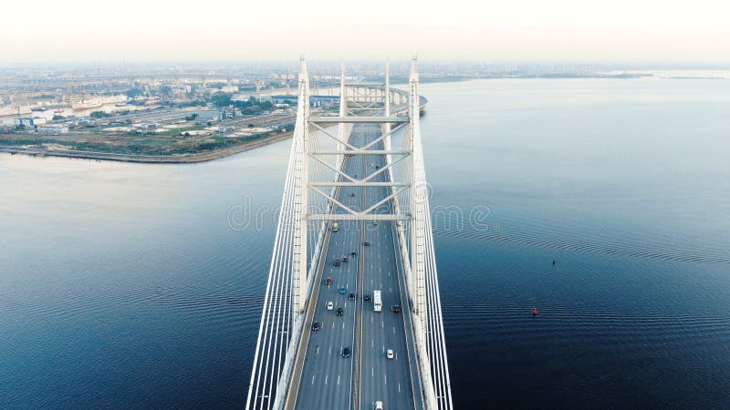 Cable-stayed bridge against beautiful city line among water