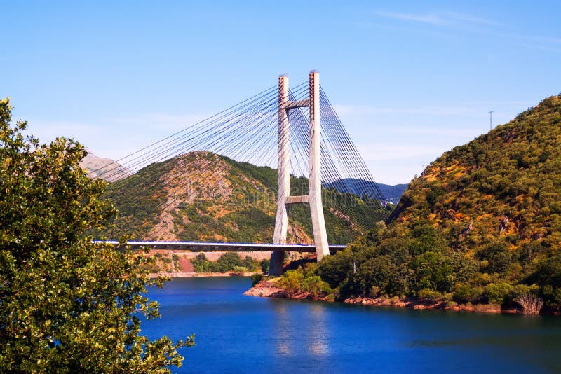 Cable-stayed bridge over reservoir royalty free stock image