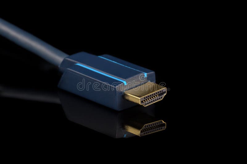 Cabo azul de HDMI no fundo preto imagem de stock royalty free Cabo azul de HDMI no fundo preto imagem de stock royalty free