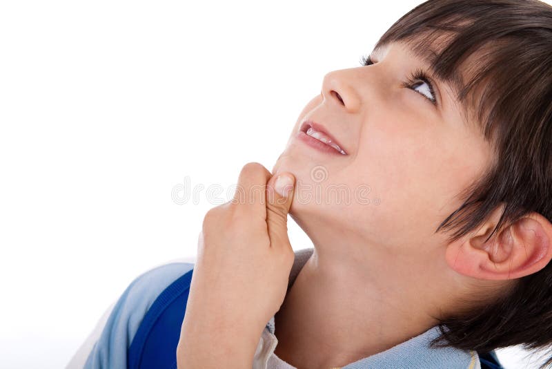 Cute kid thinking and looking up on isolated white background. Cute kid thinking and looking up on isolated white background