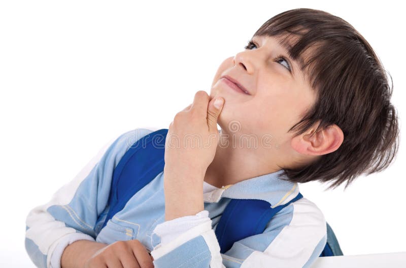 Cute kid thinking and looking up on isolated white background. Cute kid thinking and looking up on isolated white background